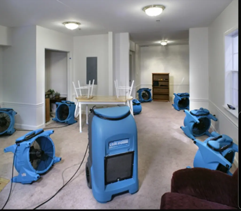 Air movers and dehumidifier setup for Water Damage Restoration in Wilna
